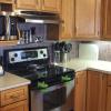 Our Brown Stone tile decals really helped to elevate this 1990's kitchen. 